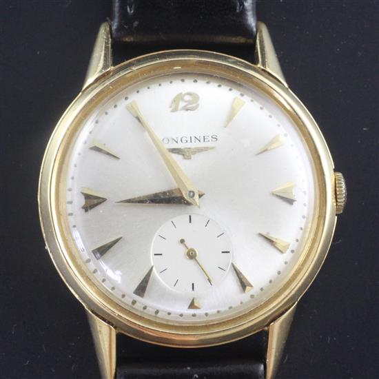 A gentlemans 1950s 18ct gold Longines manual wind wrist watch,